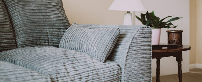 Couch and table symbolizing the therapeutic journey
