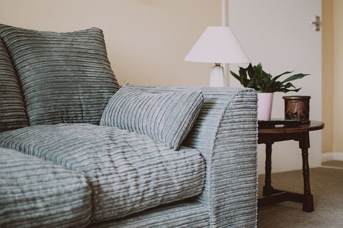 Couch and table symbolizing the therapeutic journey